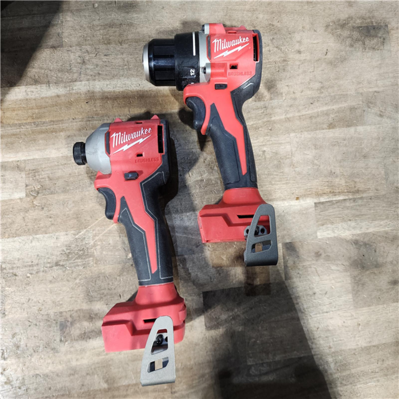 HOUSTON LOCATION - AS-IS Milwaukee M18 18V Lithium-Ion Brushless Cordless Compact Drill/Impact Combo Kit (2-Tool) W/(2) 2.0 Ah Batteries  Charger & Bag