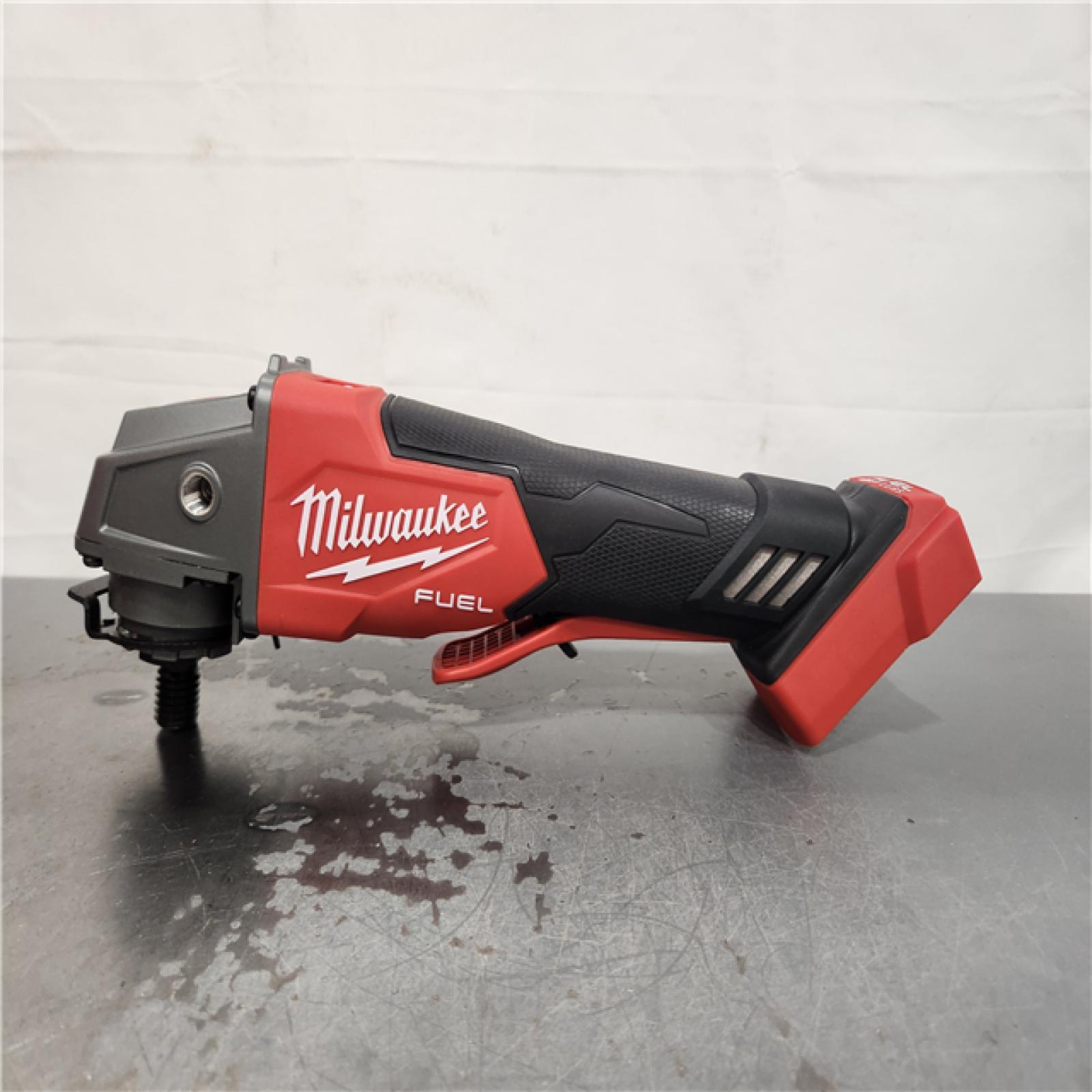 AS-IS- Milwaukee FUEL 18-Volt Lithium-Ion Brushless Cordless 4-1/2 in./5 in. Grinder W/Paddle Switch (Tool-Only)
