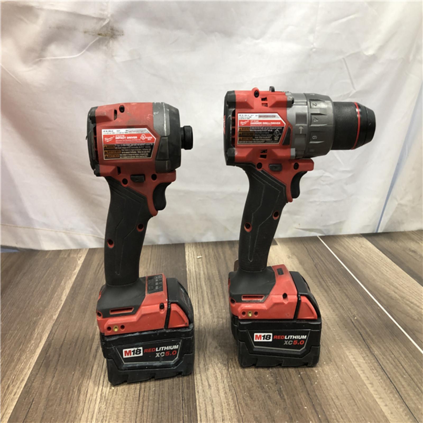 AS-IS Milwaukee FUEL 18V Lithium-Ion Brushless Cordless Hammer Drill and Impact Driver Combo Kit