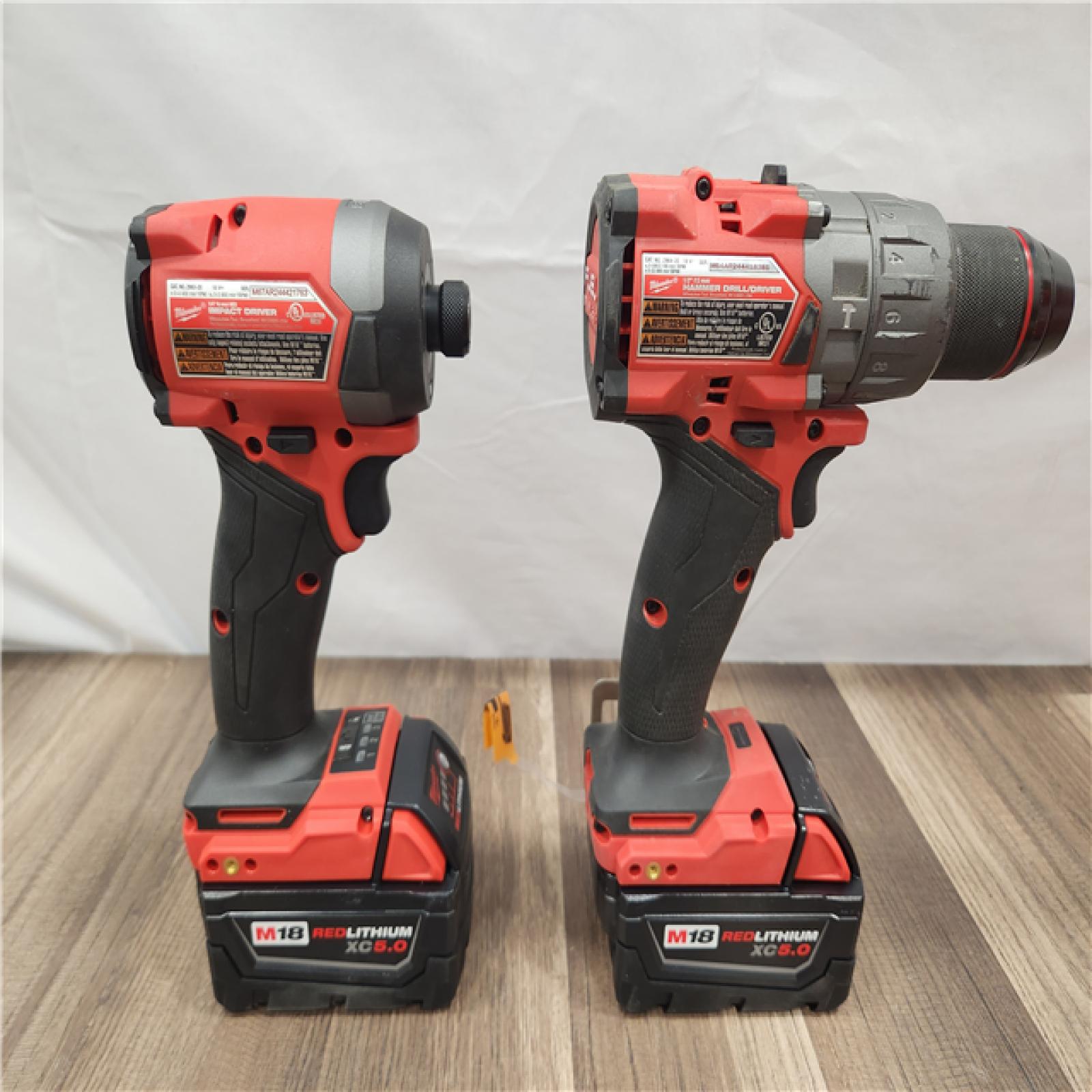 AS-IS- MILWAUKEE FUEL 18V Lithium-Ion Brushless Cordless Hammer Drill and Impact Driver Combo Kit