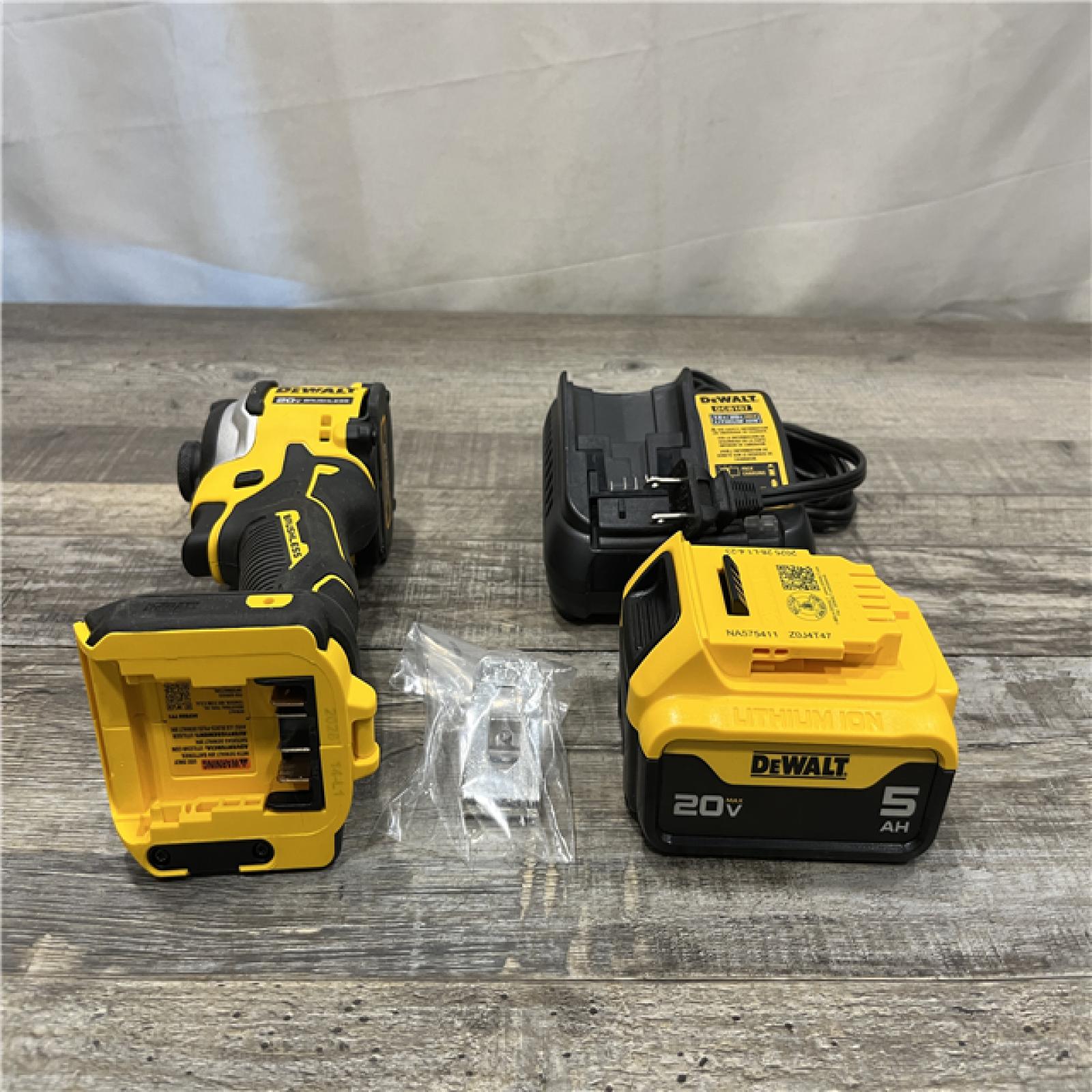 AS-IS DEWALT ATOMIC 20V MAX Lithium-Ion Cordless 1/4 in. Brushless Impact Driver Kit