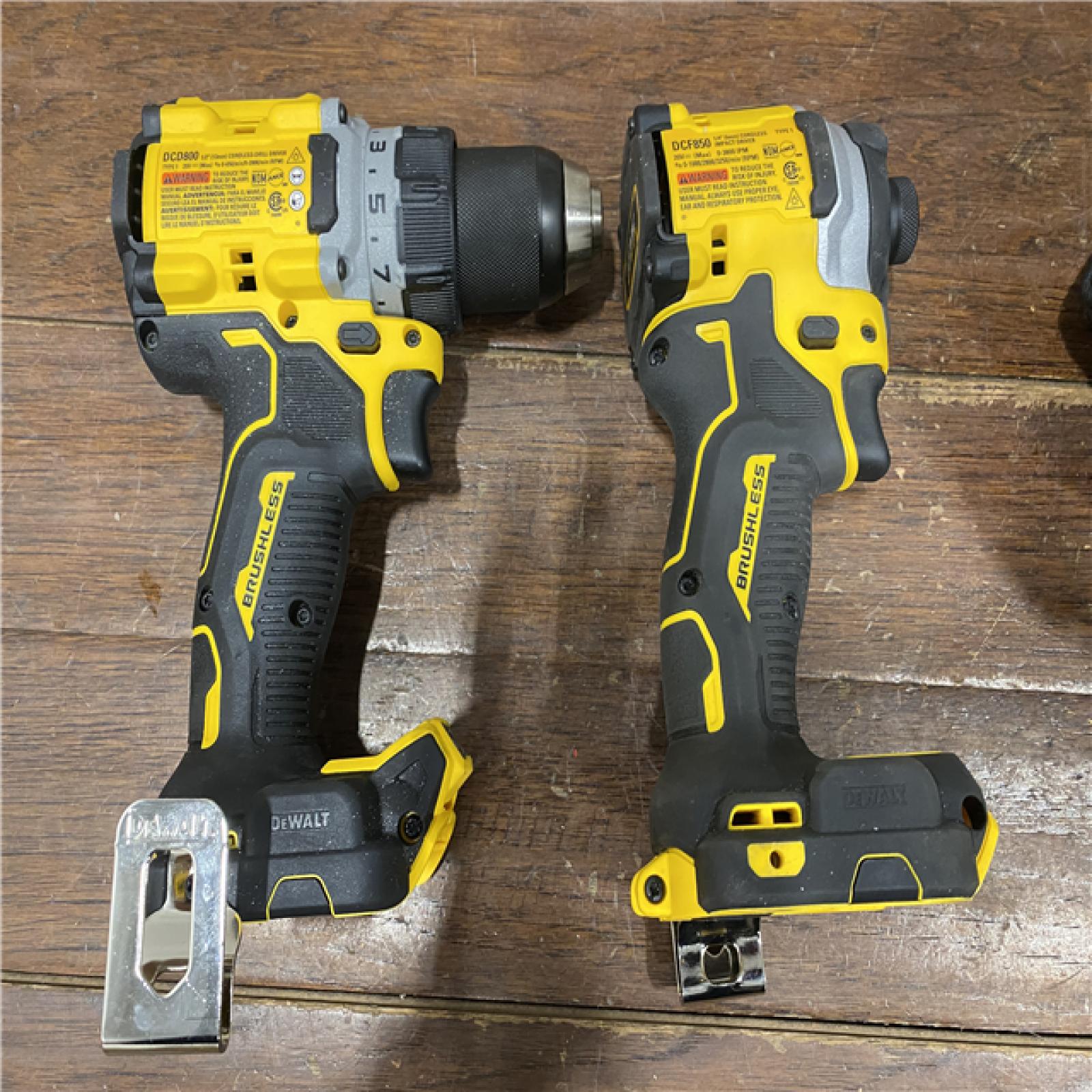 AS-IS DEWALT 20V MAX XR Cordless Drill/Driver, ATOMIC Impact Driver 2 Tool Combo Kit, (2) 2.0Ah Batteries, Charger, and Bag