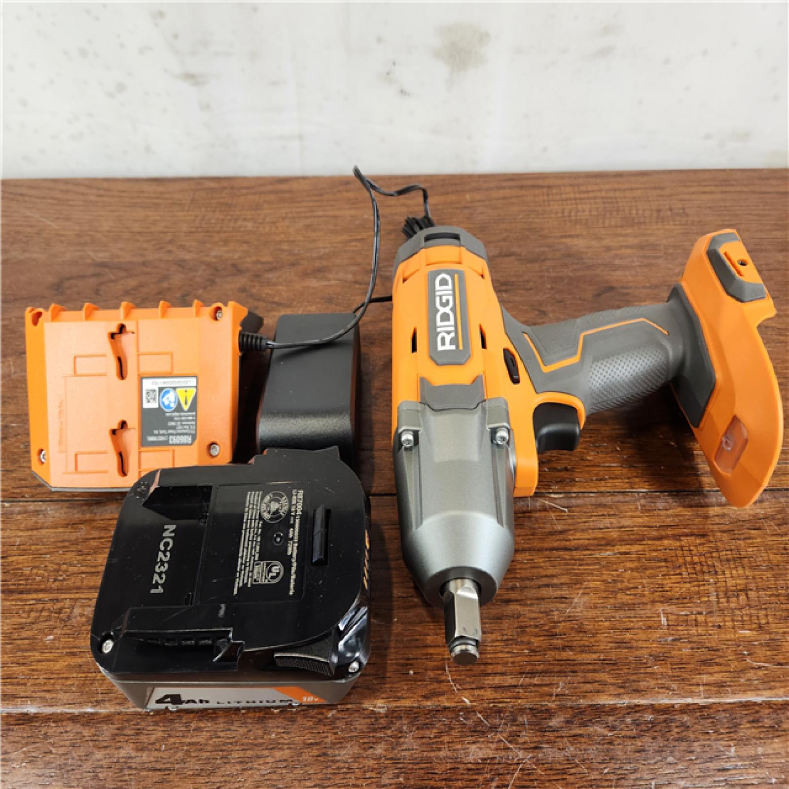 AS-IS RIDGID 18V Cordless 1/2 in. Impact Wrench Kit with 4.0 Ah Battery and Charger