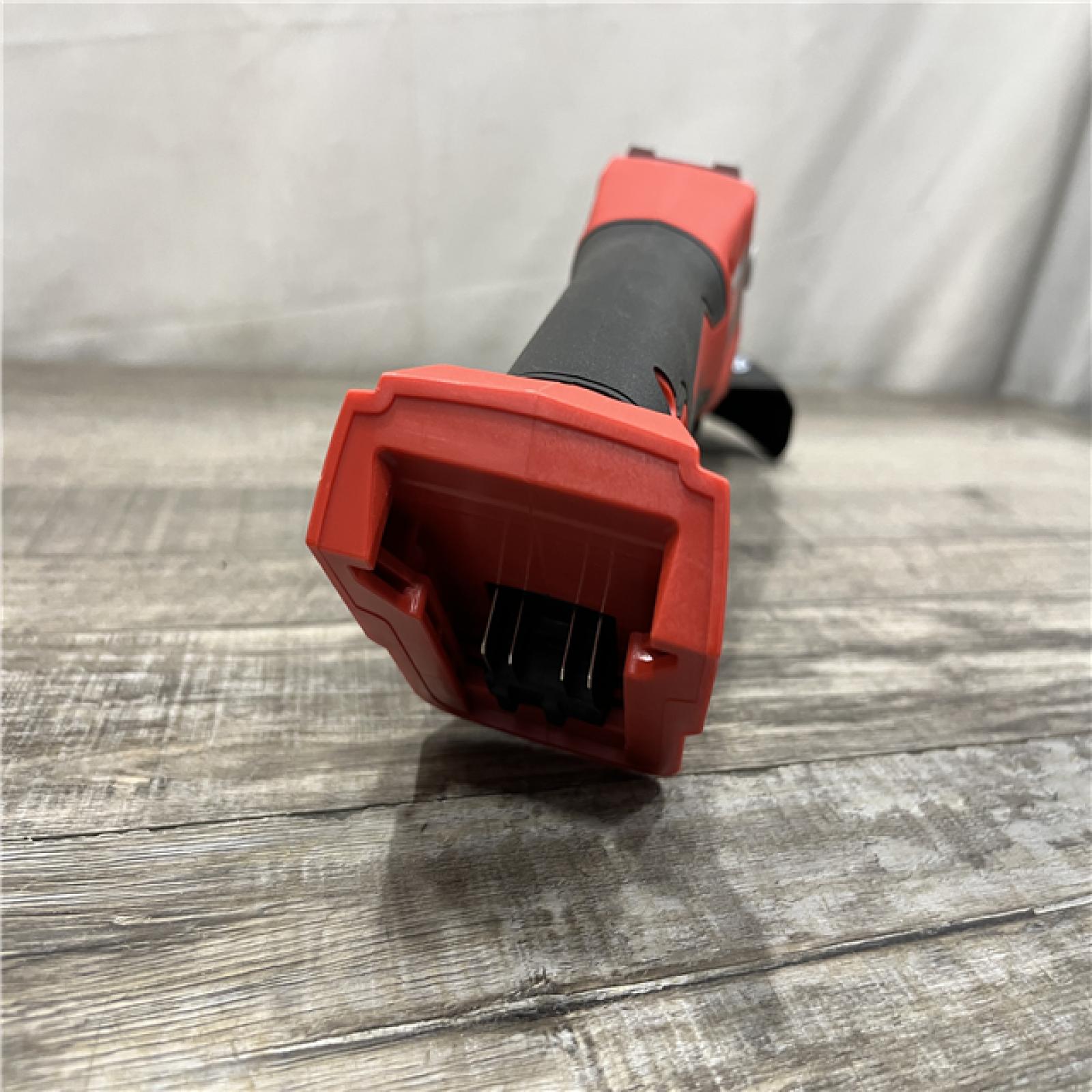 AS-IS Milwaukee 18V Lithium-Ion Brushless Cordless 4-1/2 in./5 in. Grinder w/Paddle Switch (Tool-Only)
