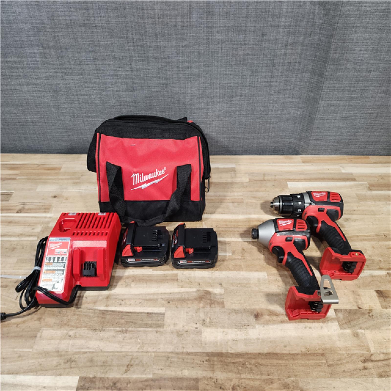 HOUSTON LOCATION - AS-IS Milwaukee M18 18V Lithium-Ion Cordless Drill Driver/Impact Driver Combo Kit