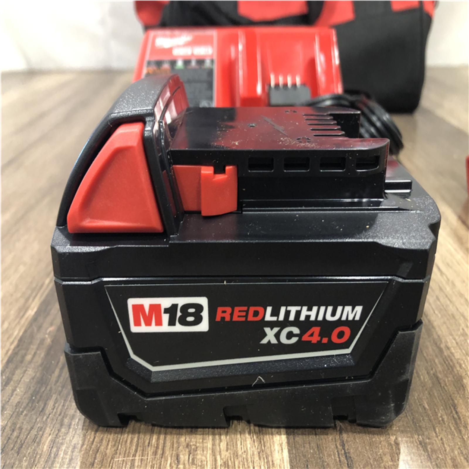 AS-IS Milwaukee 18V Lithium-Ion Compact Brushless Cordless 1/4 in. Impact Driver Kit