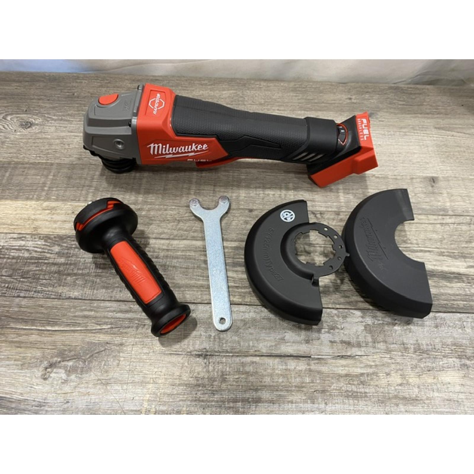 AS-IS Milwaukee FUEL 18V Lithium-Ion Brushless Cordless 4-1/2 in./5 in. Grinder with Variable Speed & Paddle Switch (Tool-Only)