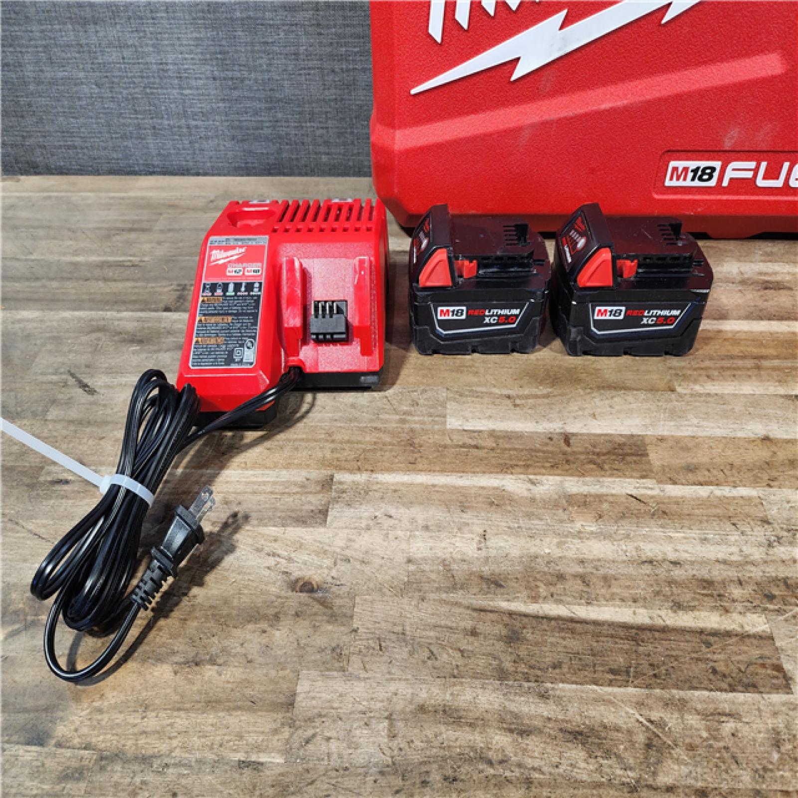 HOUSTON LOCATION - AS-IS Milwaukee FUEL 18V Lithium-Ion Brushless Cordless Hammer Drill and Impact Driver Combo Kit