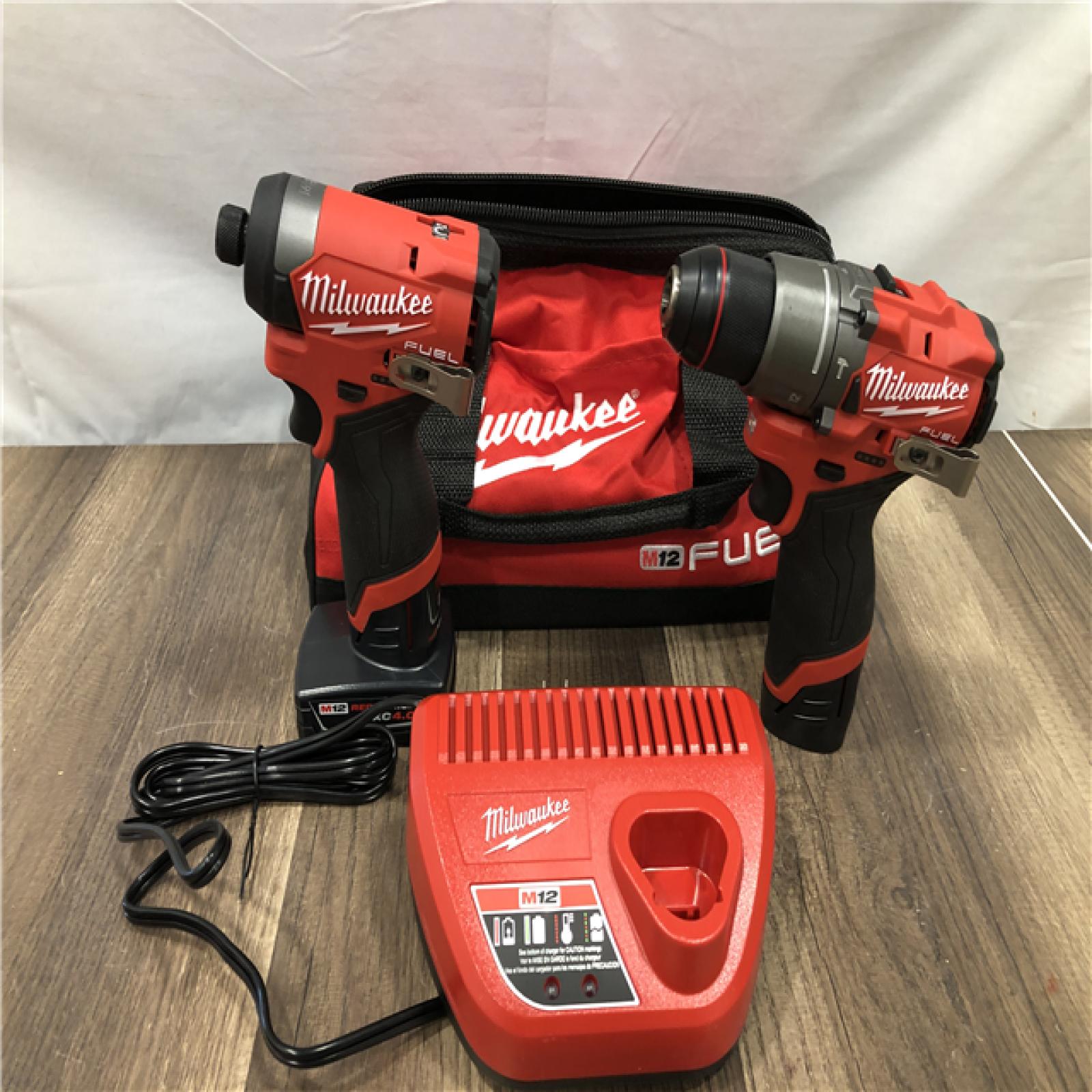 AS-IS Milwaukee FUEL 12-Volt Lithium-Ion Brushless Cordless Hammer Drill and Impact Driver Combo Kit