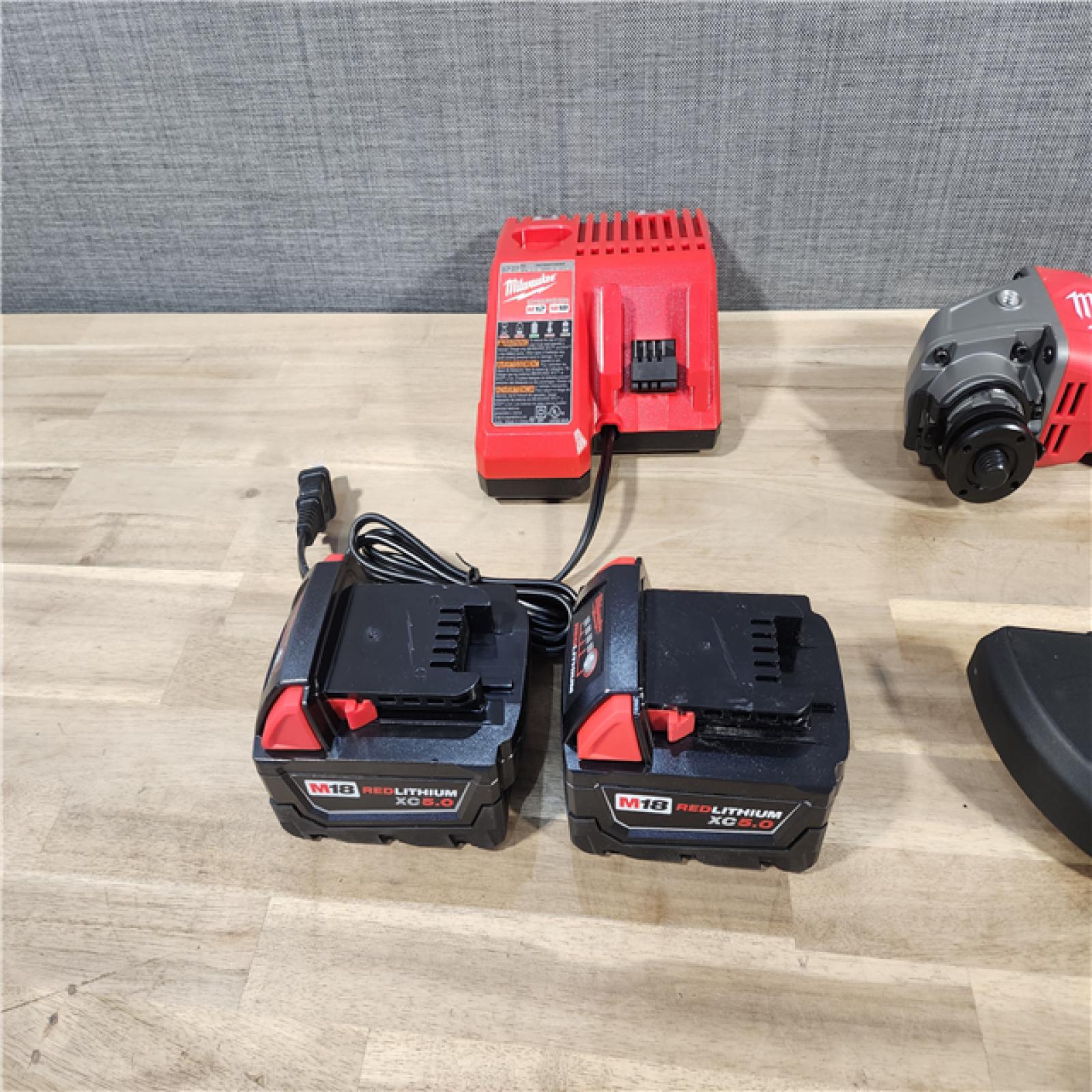 HOUSTON LOCATION - AS-IS M18 FUEL 18V Lithium-Ion Brushless Cordless Grinder & 3/8 in. Impact Wrench Combo Kit (2-Tool) W/ Two 5Ah Batteries
