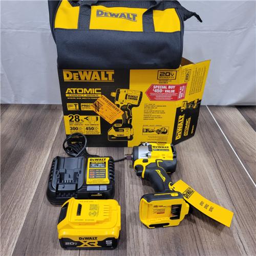 LIKE NEW! DEWALT ATOMIC 20V MAX Lithium-Ion Brushless Cordless 1/2 in. Variable Speed Impact Wrench Kit with 5 Ah Battery and Charger