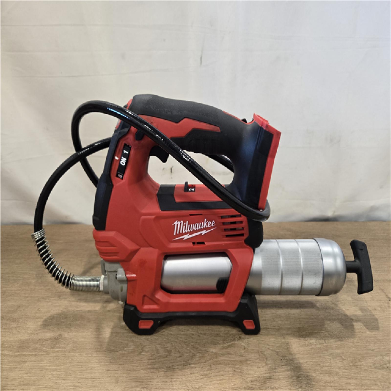 AS-IS Milwaukee 18V Lithium-Ion Cordless Grease Gun 2-Speed (Tool-Only)