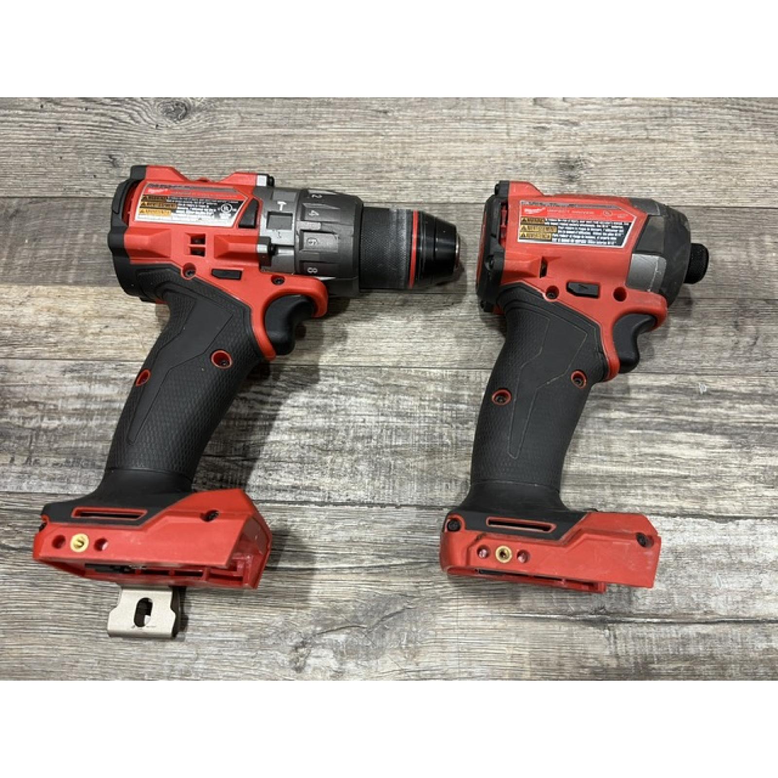 AS-IS Milwaukee FUEL 18V Lithium-Ion Brushless Cordless Hammer Drill and Impact Driver Combo Kit