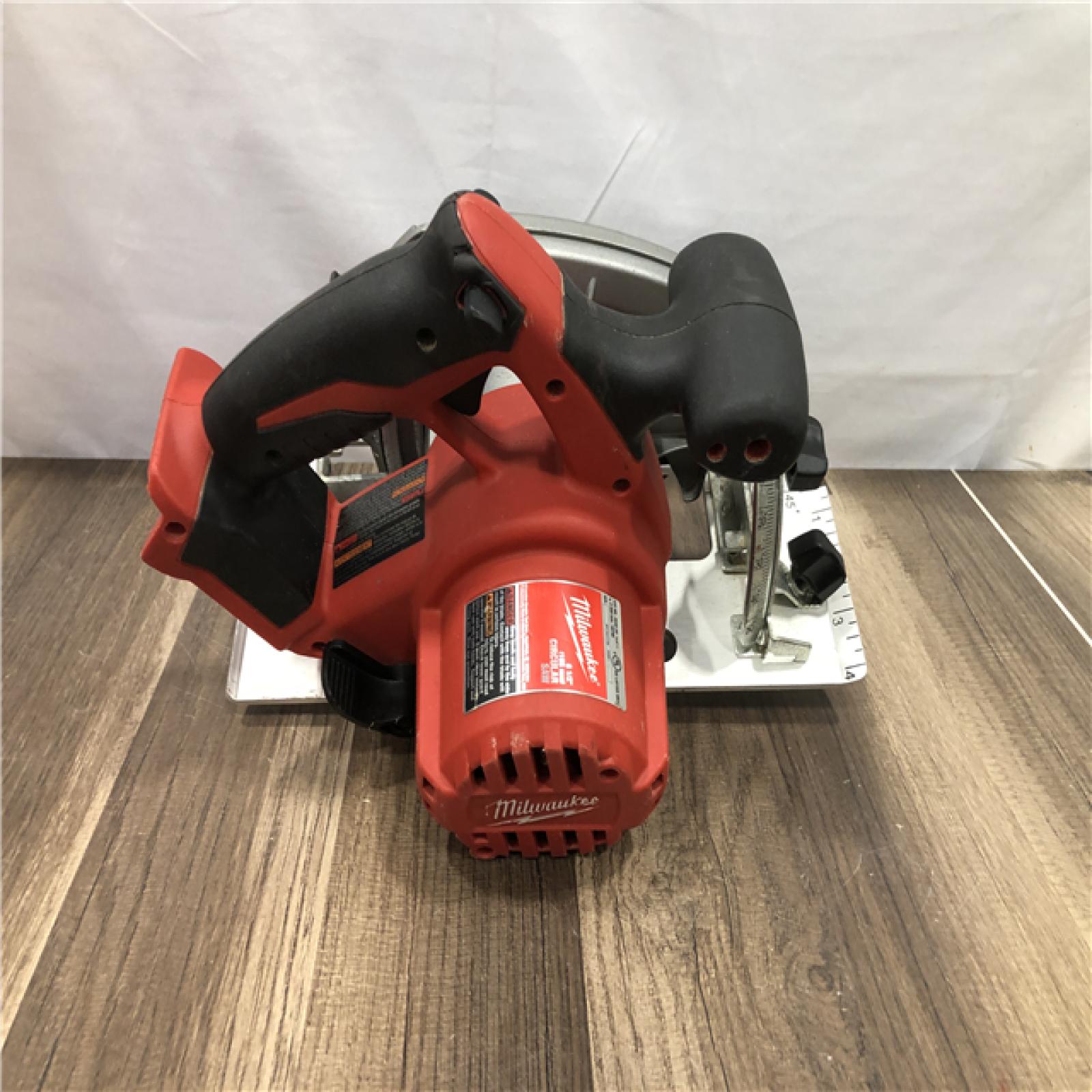 AS-IS Milwaukee 18V Lithium-Ion Cordless 6-1/2 in. Circular Saw (Tool-Only)