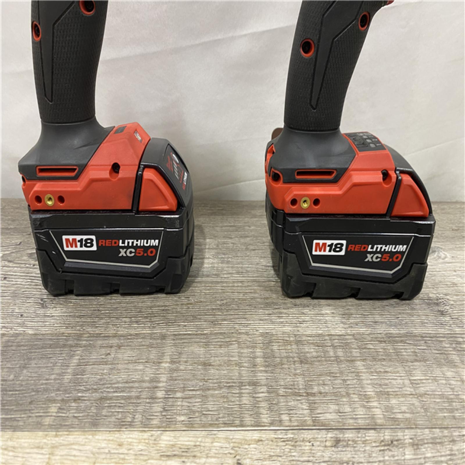 AS-IS Milwaukee FUEL 18V Lithium-Ion Brushless Cordless Hammer Drill and Impact Driver Combo Kit