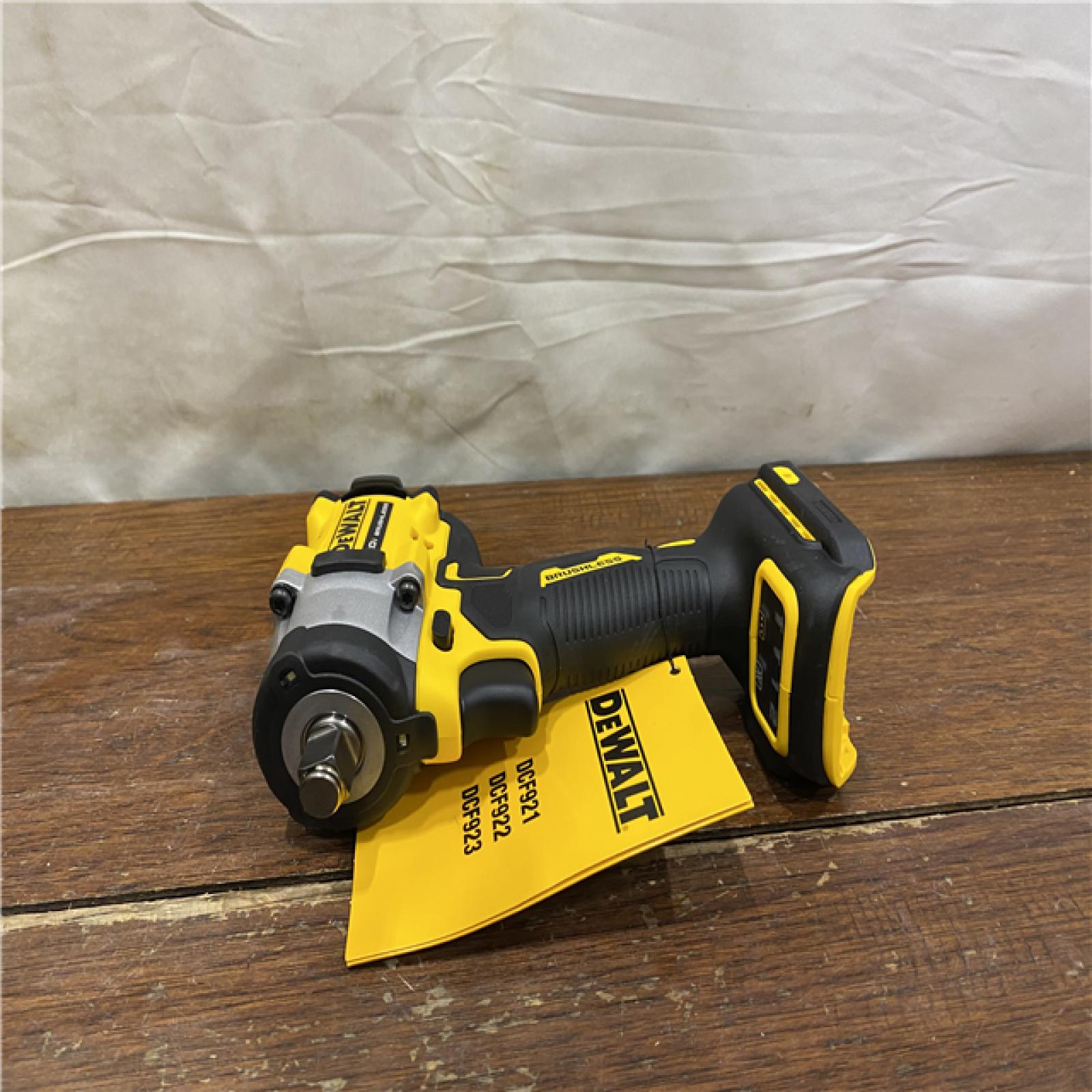 AS-IS ATOMIC 20V MAX Lithium-Ion Brushless Cordless 1/2 in. Variable Speed Impact Wrench Kit with 5 Ah Battery and Charger