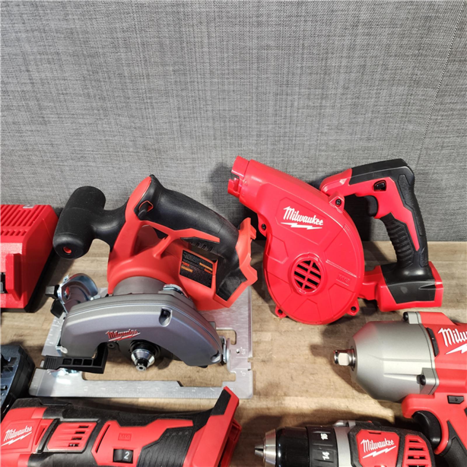 HOUSTON LOCATION - AS-IS Milwaukee M18 18-Volt Lithium-Ion Cordless Combo Kit (9-Tool) with (2) Batteries  Charger  and Tool Bag