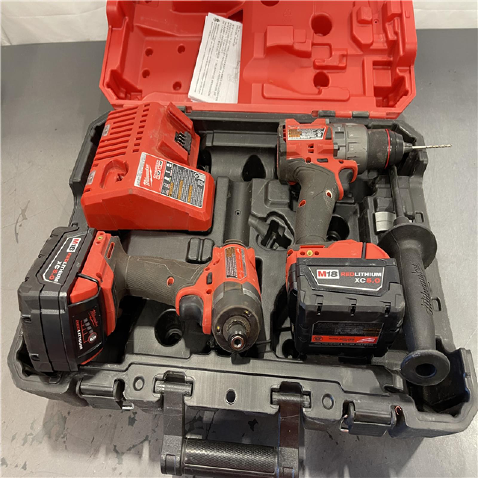 AS-IS - Milwaukee M18 FUEL 18V Lithium-Ion Brushless Cordless Hammer Drill and Impact Driver Combo Kit