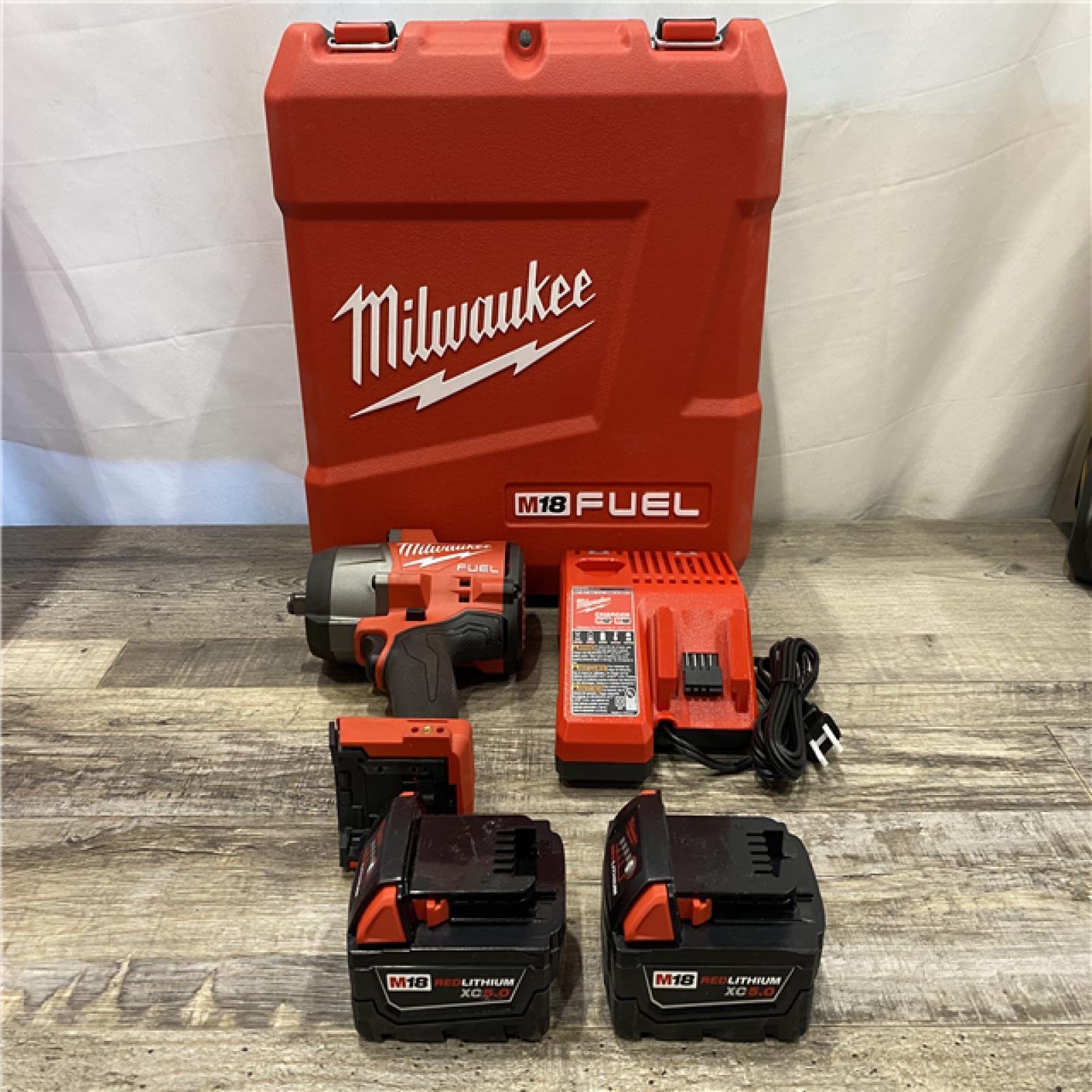 AS-IS Milwaukee FUEL 18V Lithium-Ion Brushless Cordless High-Torque 1/2 in. Impact Wrench w/Friction Ring Kit