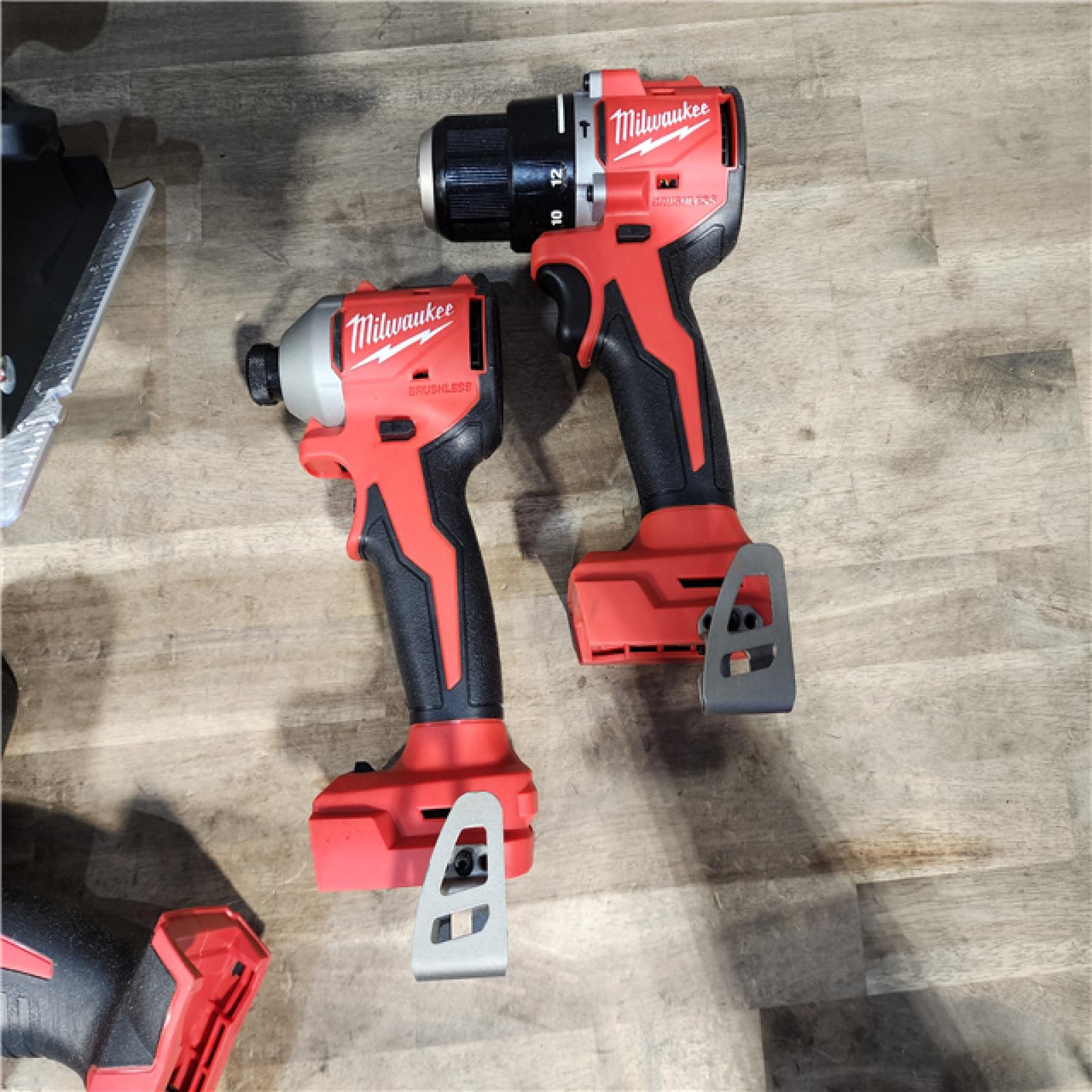 HOUSTON LOCATION - AS-IS (APPEARS LIKE NEW) Milwaukee M18 18-Volt Lithium-Ion Brushless Cordless Combo Kit (4-Tool) with 2-Batteries  1-Charger and Tool Bag