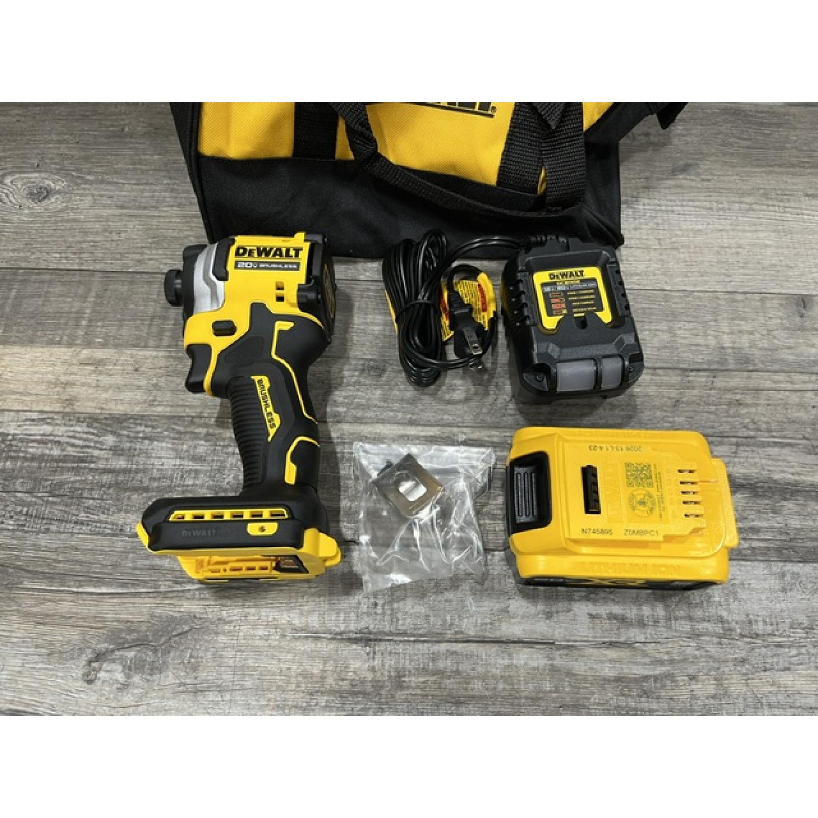 AS-IS DEWALT ATOMIC 20V MAX Lithium-Ion Cordless 1/4 in. Brushless Impact Driver Kit