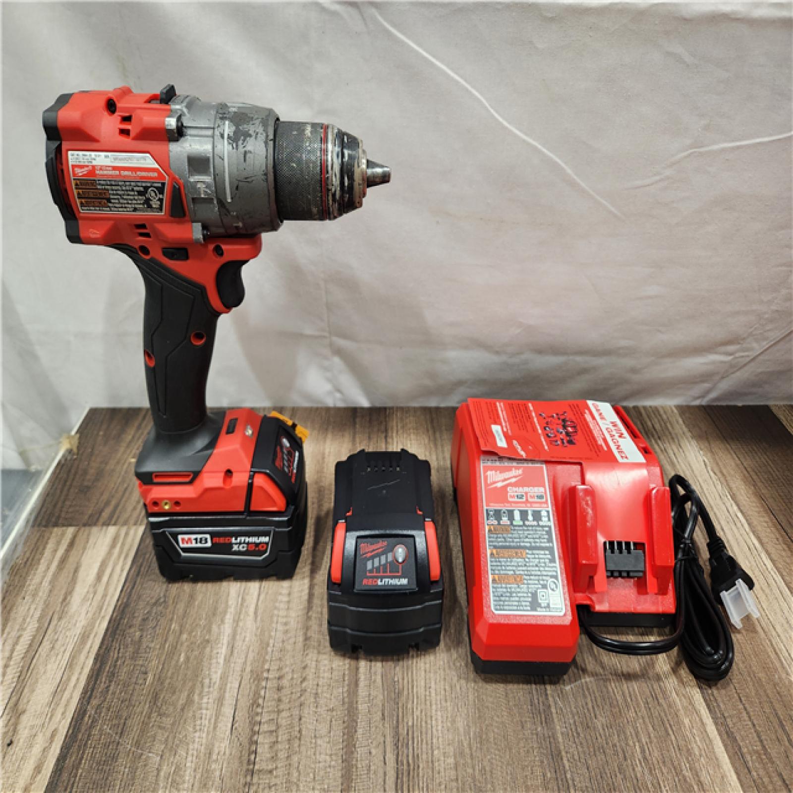 AS-IS- Milwaukee Hammer Drill Driver Kit with Batteries and Charger