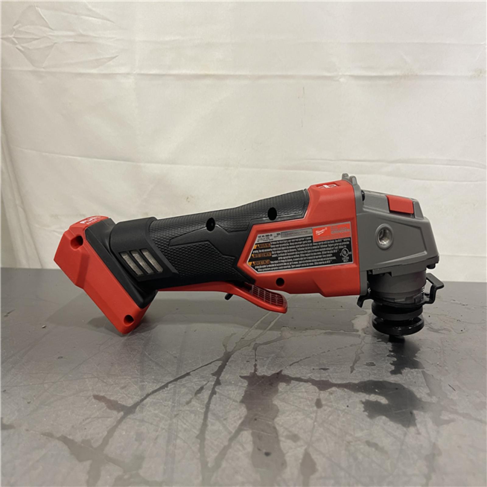 AS-IS- Milwaukee FUEL 18-Volt Lithium-Ion Brushless Cordless 4-1/2 in./5 in. Grinder W/Paddle Switch (Tool-Only)
