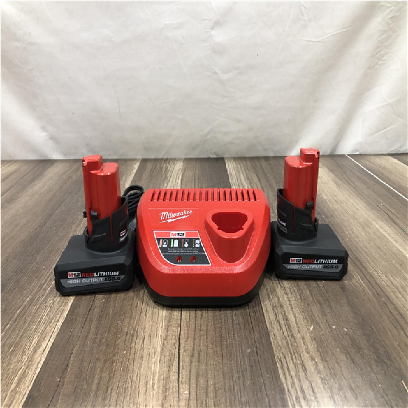as-is Milwaukee 12V Lithium-Ion XC High Output 5.0 Ah Battery Pack (2-Pack) Starter Kit with Charger