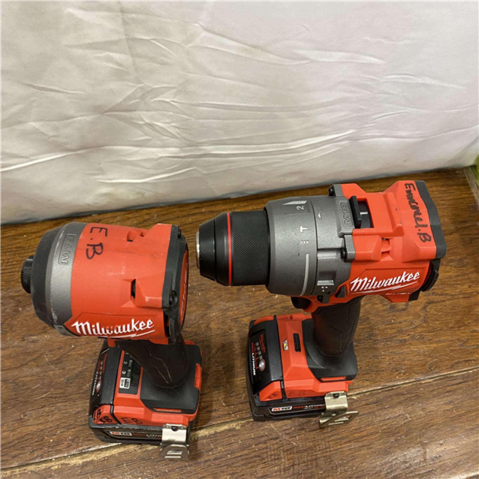 AS-IS MILWAUKEE M18 FUEL 18V Lithium-Ion Brushless Cordless Hammer Drill and Impact Driver Combo Kit (2-Tool) with 2 Batteries