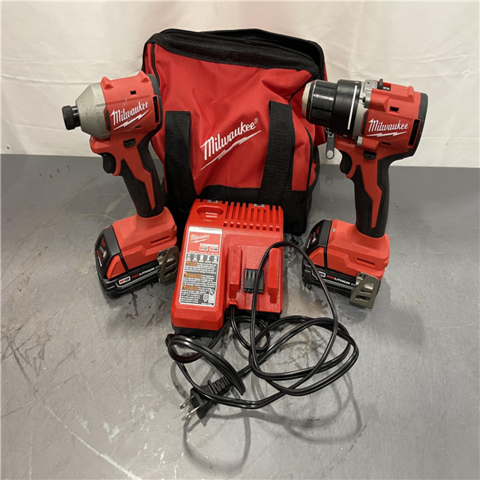 AS-IS - Milwaukee M18 18V Lithium-Ion Brushless Cordless Compact Drill/Impact Combo Kit