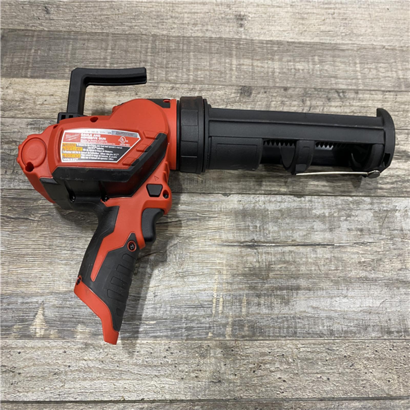 AS-IS Milwaukee 12V Lithium-Ion Cordless 10 oz. Adhesive and Caulk Gun (Tool-Only)