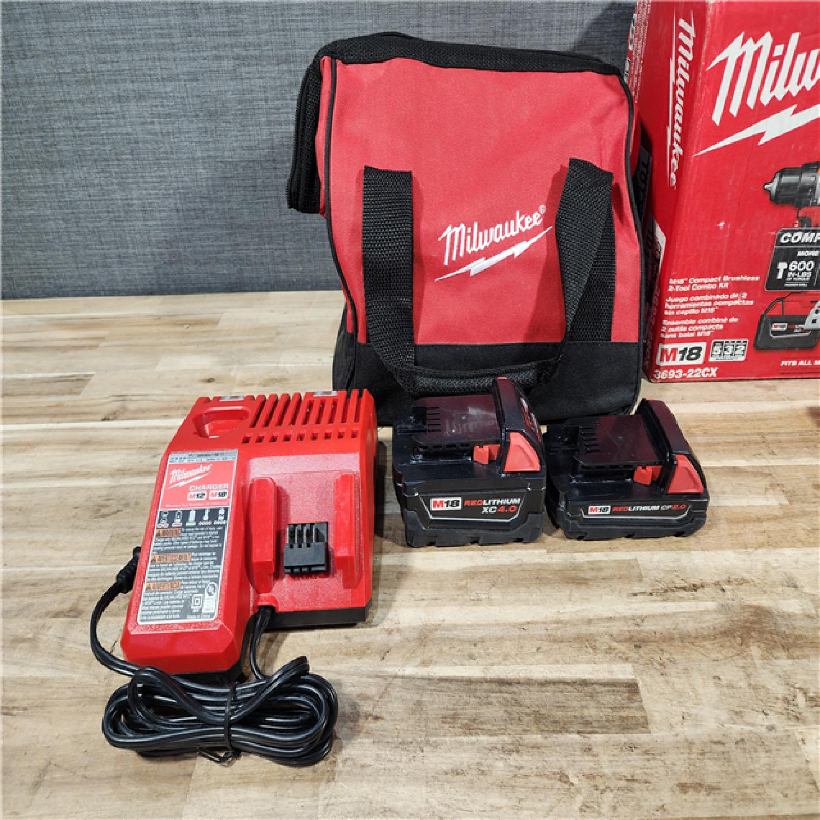 HOUSTON LOCATION - AS-IS M18 18-Volt Lithium-Ion Brushless Cordless Compact Hammer Drill/Impact Combo Kit (2-Tool) with (2) Batteries  Bag