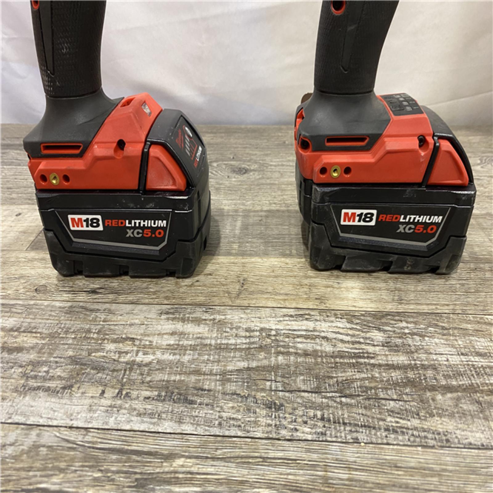 AS-IS Milwaukee FUEL 18V Lithium-Ion Brushless Cordless Hammer Drill and Impact Driver Combo Kit