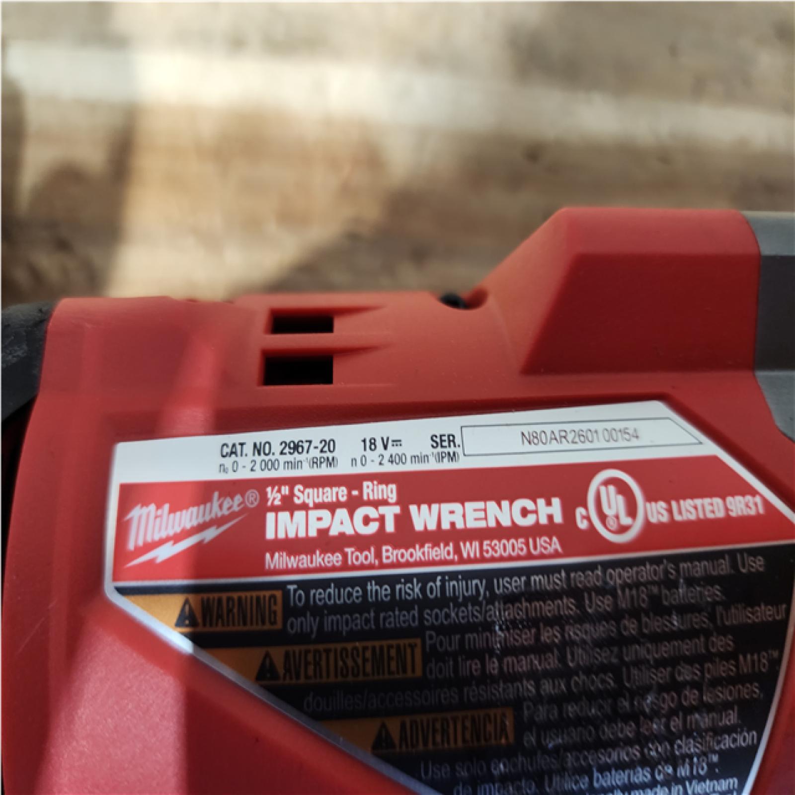 Houston Location AS-IS Milwaukee FUEL Impact and Battery with Charger