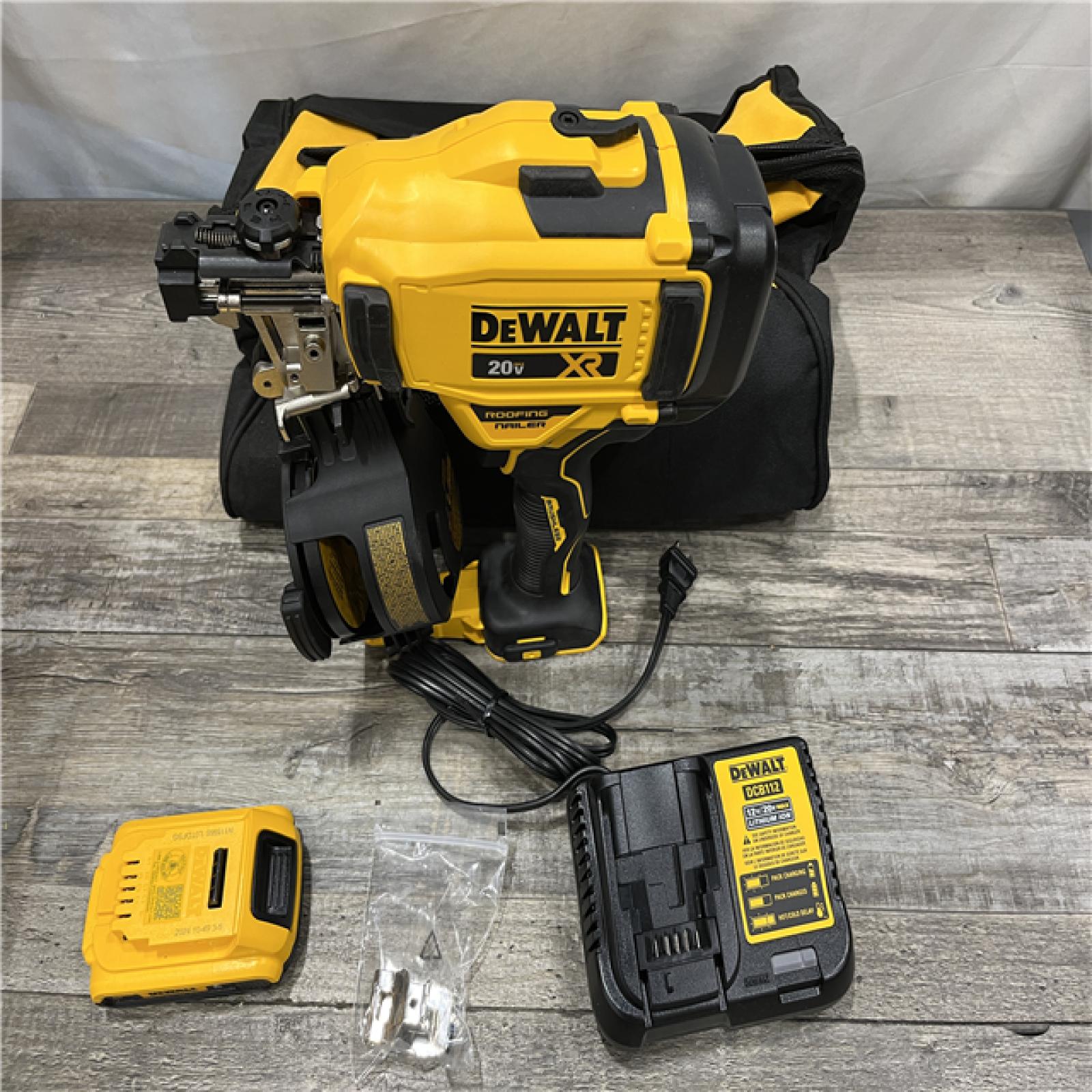 AS-IS DEWALT 20V MAX Lithium-Ion 15-Degree Electric Cordless Roofing Nailer Kit
