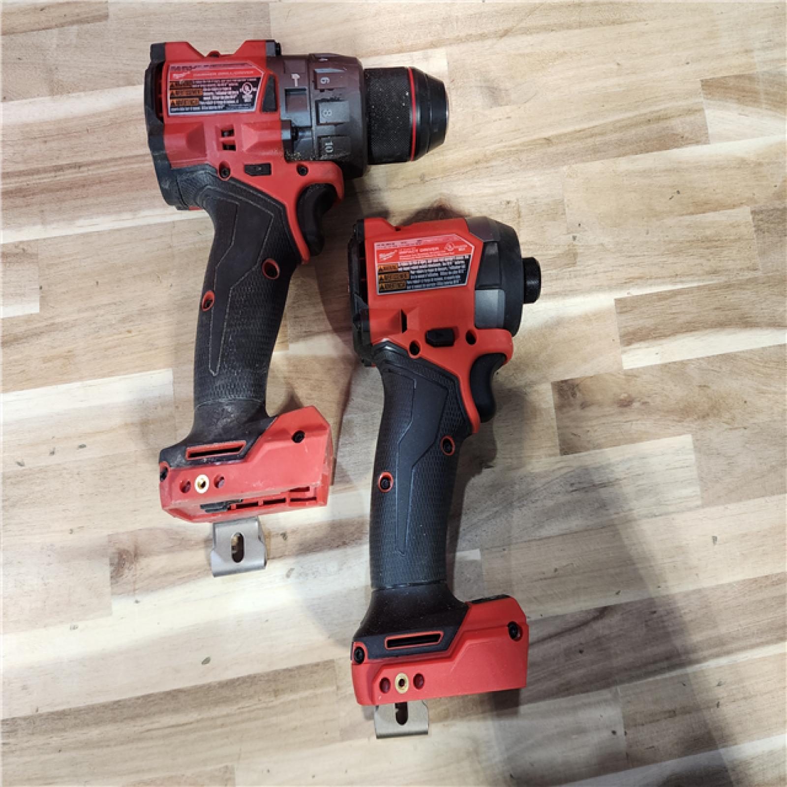 HOUSTON LOCATION - AS-IS Milwaukee FUEL 18V Lithium-Ion Brushless Cordless Hammer Drill and Impact Driver Combo Kit