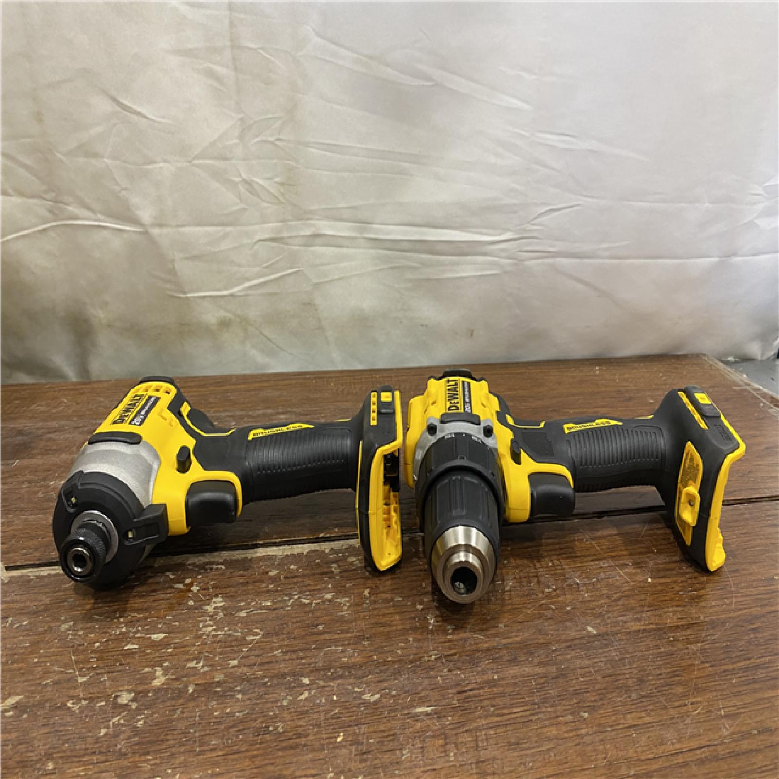 AS-IS Dewalt DCK225D2 20V MAX ATOMIC Brushless Compact Lithium-Ion 1/2 in. Cordless Drill Driver and 1/4 in. Impact Driver Combo Kit with 2 Batteries 2 Ah