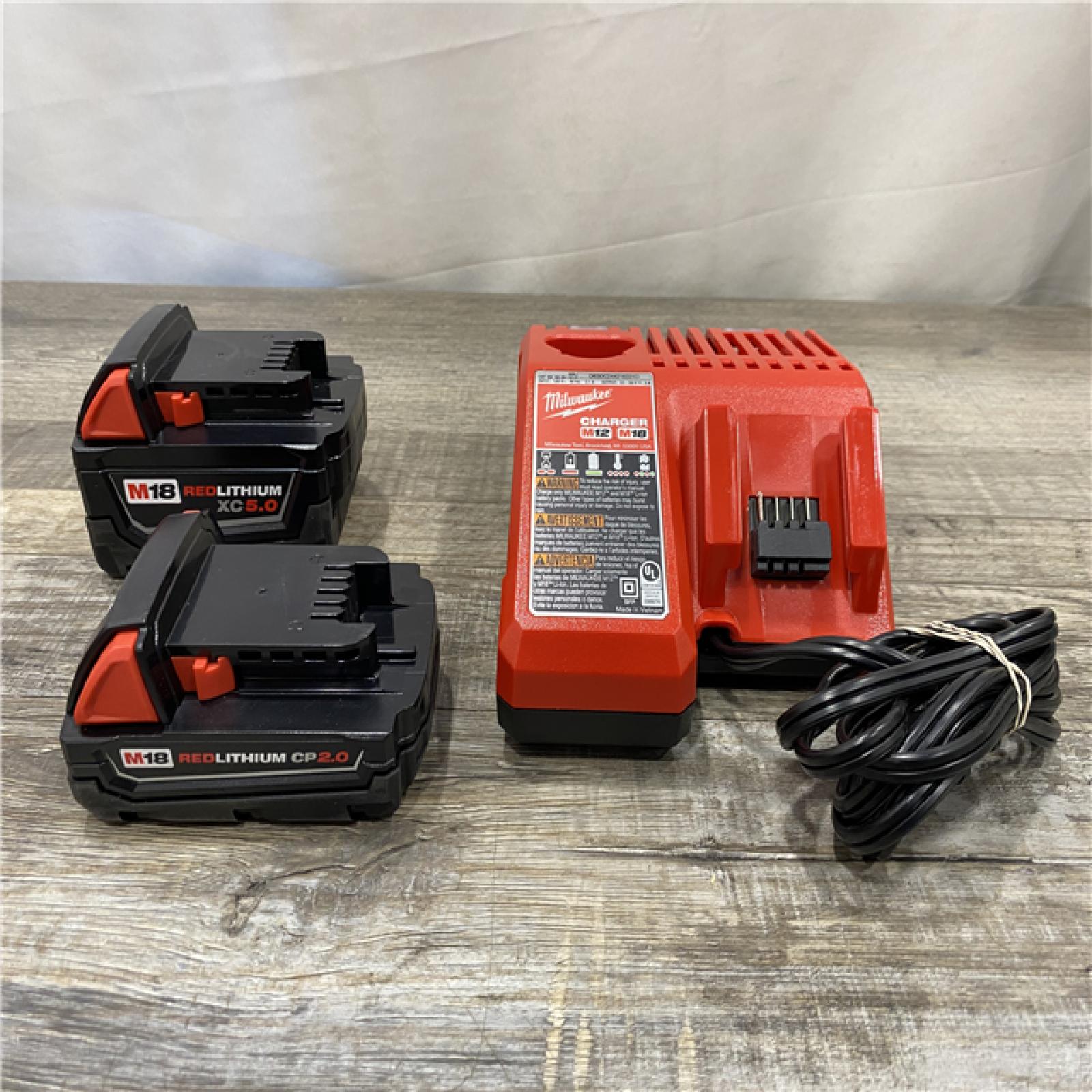 AS-IS Milwaukee 18-Volt Lithium-Ion Starter Kit with One 5.0 Ah and One 2.0 Ah Battery and Charger