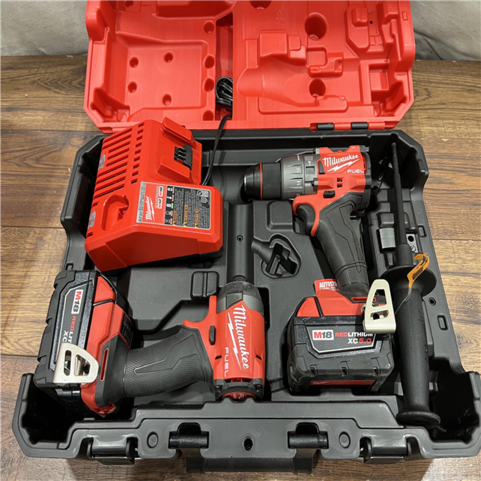 AS-IS Milwaukee M18 FUEL 18V Lithium-Ion Brushless Cordless Hammer Drill and Impact Driver Combo Kit (2-Tool) with 2 Batteries