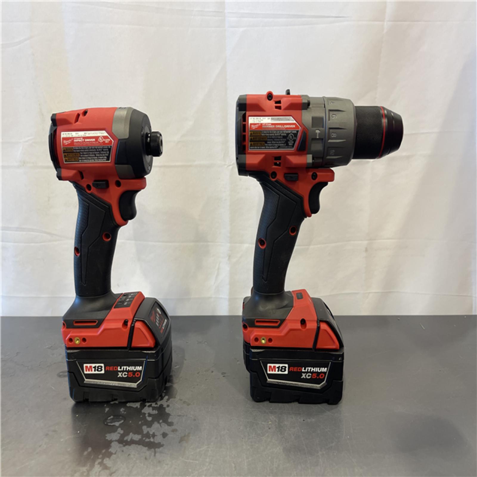 AS-IS- MILWAUKEE FUEL 18V Lithium-Ion Brushless Cordless Hammer Drill and Impact Driver Combo Kit