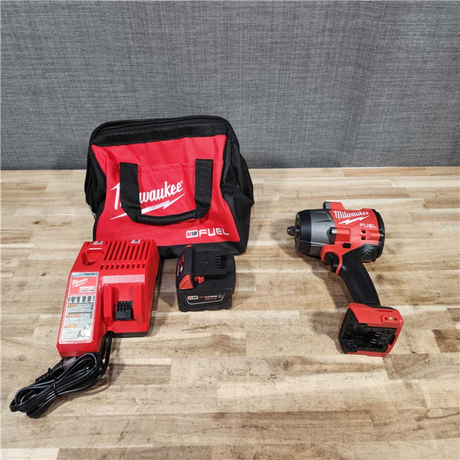 HOUSTON LOCATION - AS-IS (APPEARS LIKE NEW) Milwaukee FUEL 18V Lithium-Ion Brushless Cordless 1/2 in. Impact Wrench w/Friction Ring Kit