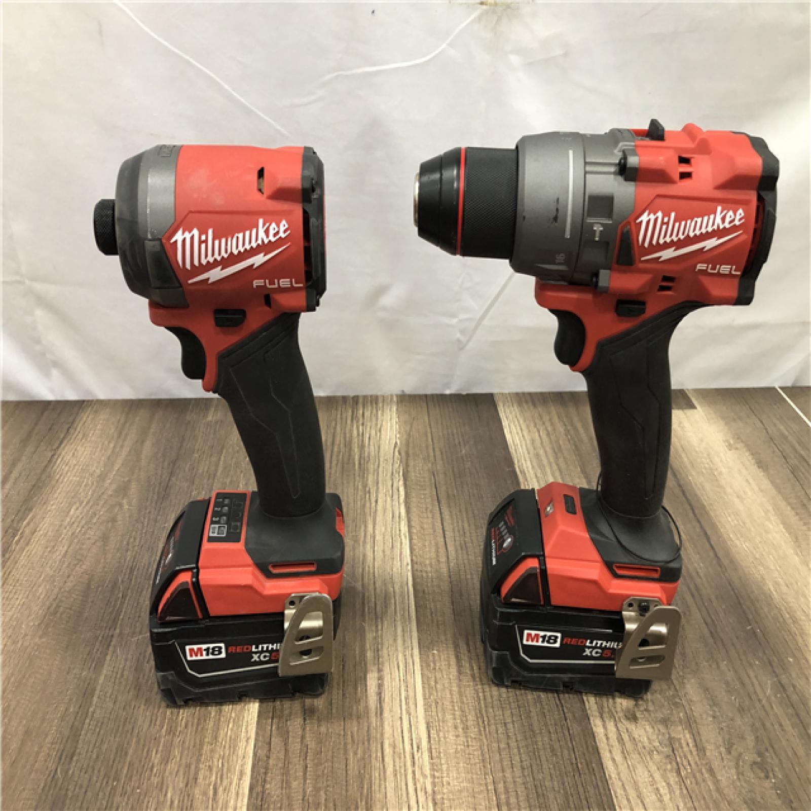 AS-IS Milwaukee FUEL 18V Lithium-Ion Brushless Cordless Hammer Drill and Impact Driver Combo Kit