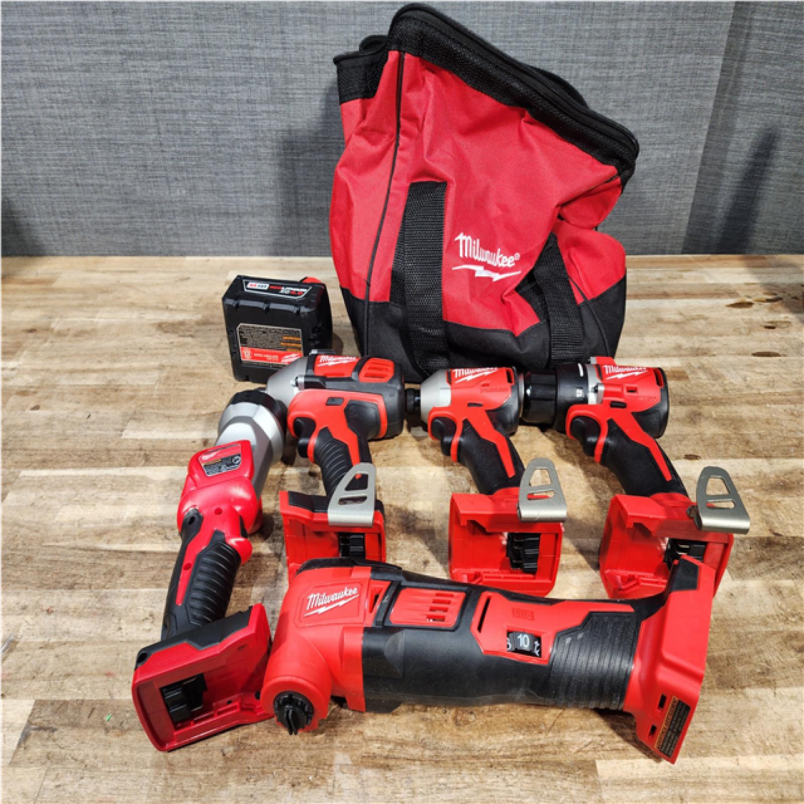 Houston Location AS-IS Milwaukee Drill and Impact Driver and Impact Wrench and Multitool and Work Light and Battery