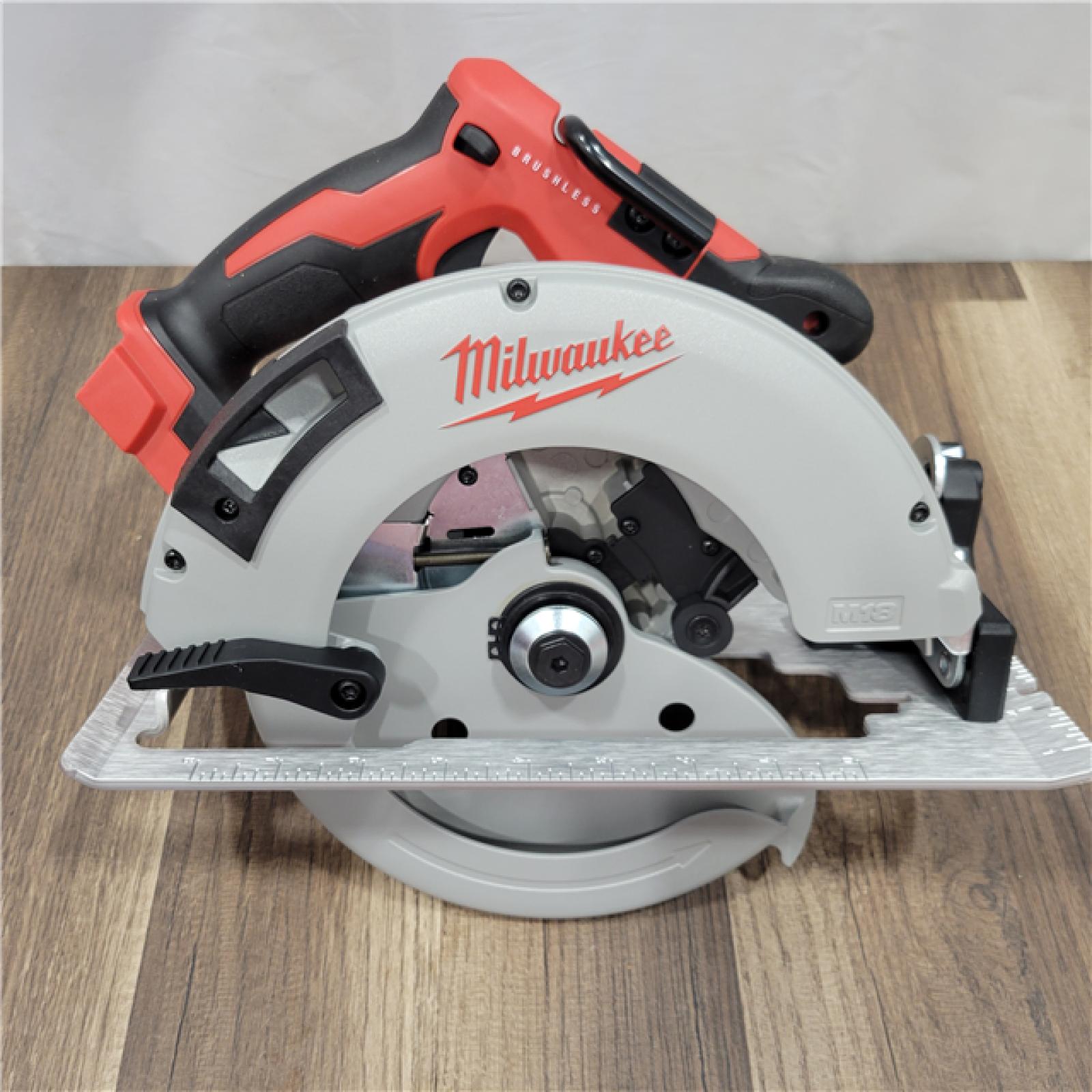 AS-IS Milwaukee M18 18-Volt Lithium-Ion Brushless Cordless Combo Kit (4-Tool) with 2-Batteries, 1-Charger and Tool Bag