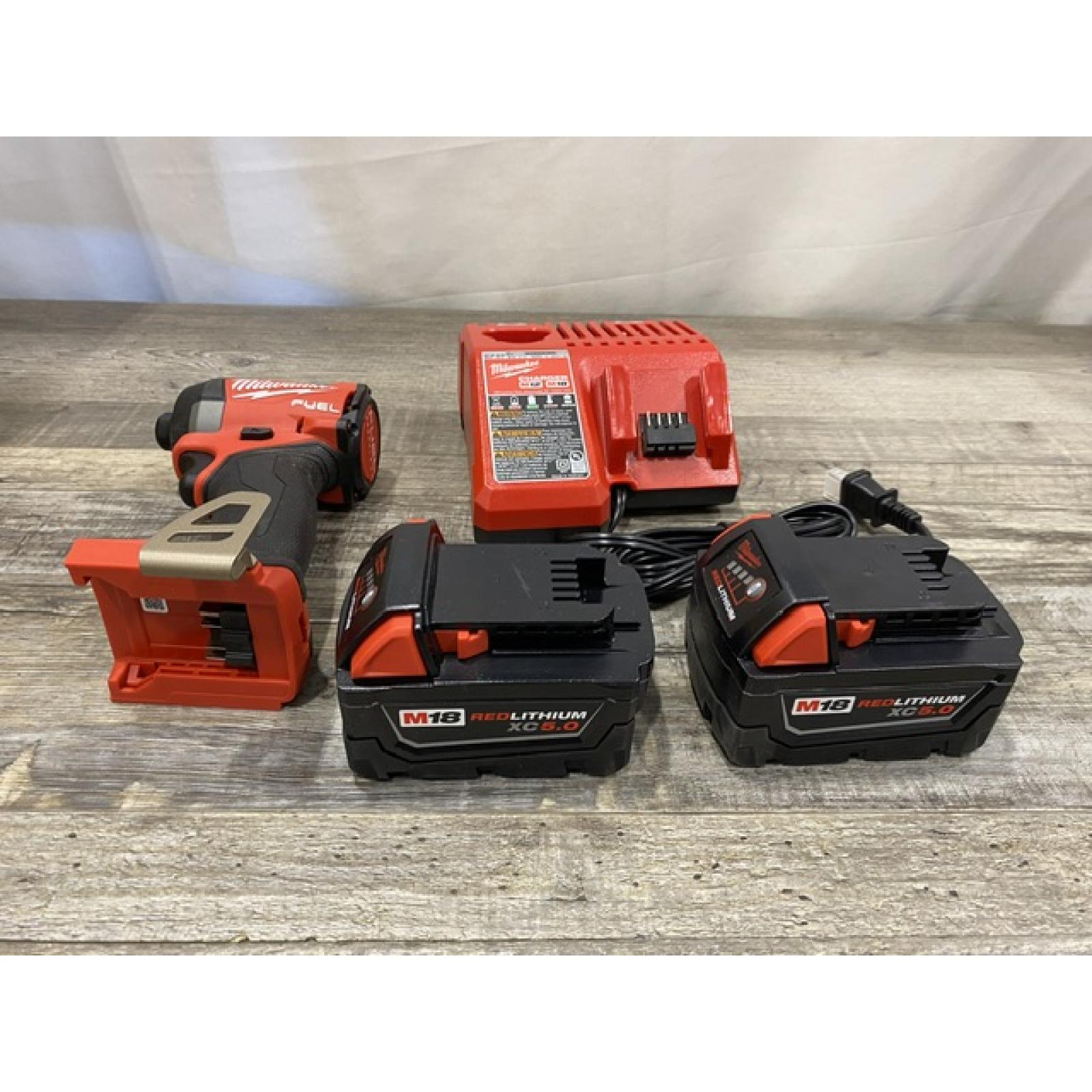 AS-IS Milwaukee FUEL 18V Lithium-Ion Brushless Cordless 1/4 in. Hex Impact Driver Kit