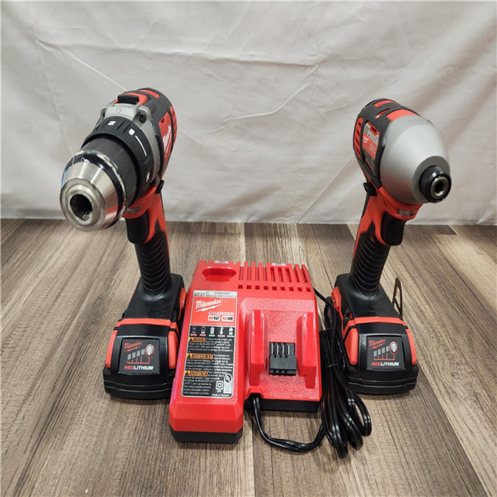 AS-IS- Milwaukee 18V Cordless Brushed 2-Tool Drill/Driver and Impact Driver Kit