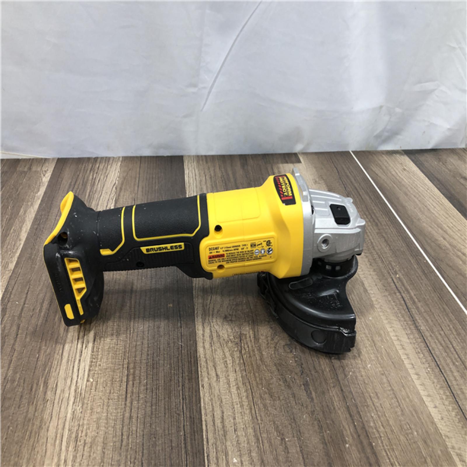AS-IS DEWALT 20-Volt MAX Cordless Brushless 4-1/2 in. Angle Grinder with Slide Switch (Tool Only)