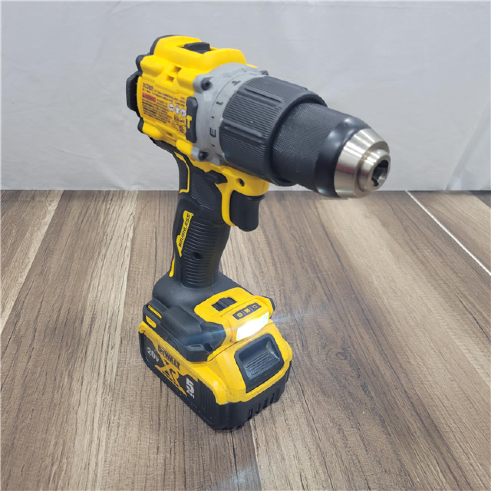 AS-IS DEWALT 20V Lithium-Ion Compact Cordless 1/2 in. Hammer Drill with 20V MAX XR 5 Ah Battery Pack and Charger