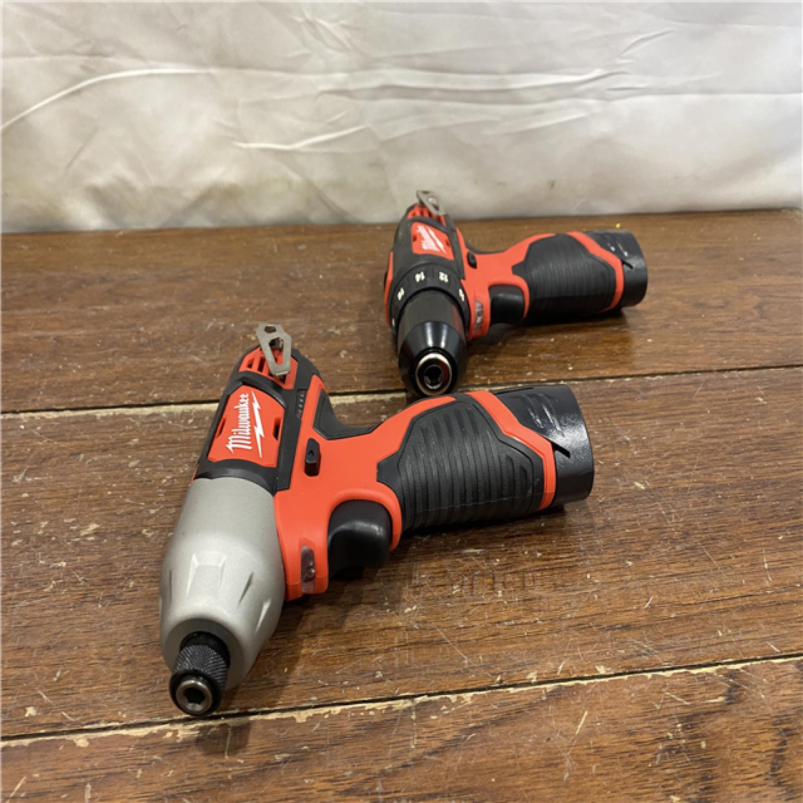 AS-IS Milwaukee M12 12V Lithium-Ion Cordless Drill Driver/Impact Driver Combo Kit with Two 1.5Ah Batteries, Charger and Bag (2-Tool)
