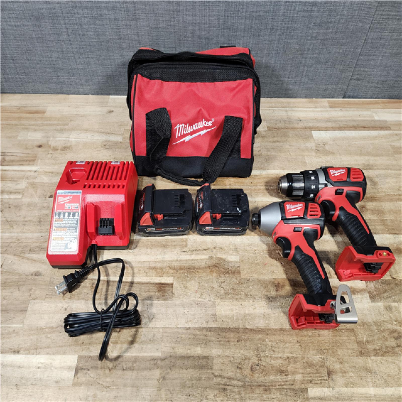 HOUSTON LOCATION - AS - IS Milwaukee 18V Lithium-Ion Cordless Drill Driver/Impact Driver Combo Kit
